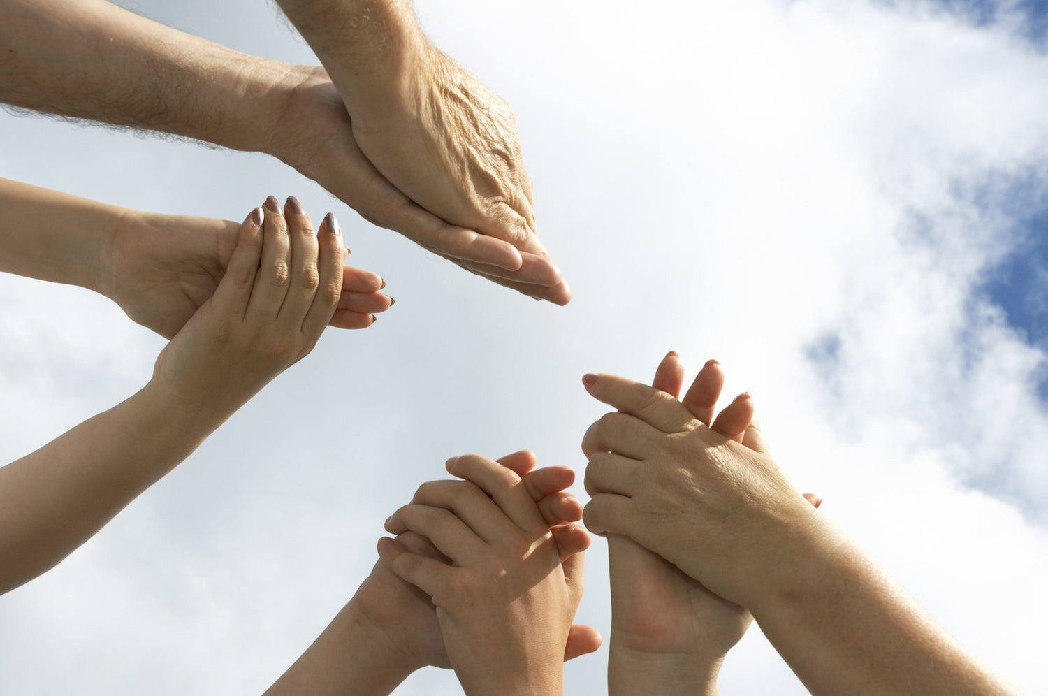folded hands raised to the sky